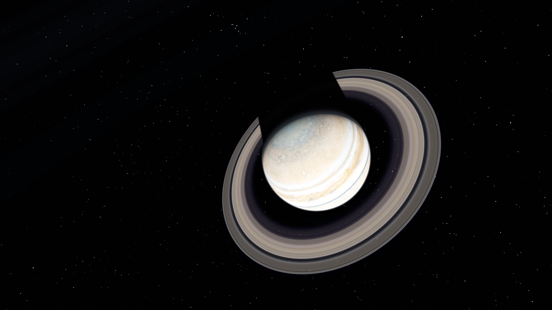 Banded gas giant with broad rings against a starfield.